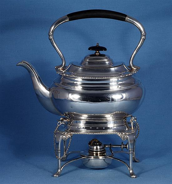 A silver kettle on stand, Height 12 ½”/318mm Width 10”/254mm., Weight 50oz/1418grms.